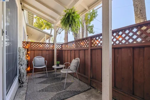 a view of a chairs and table in the room