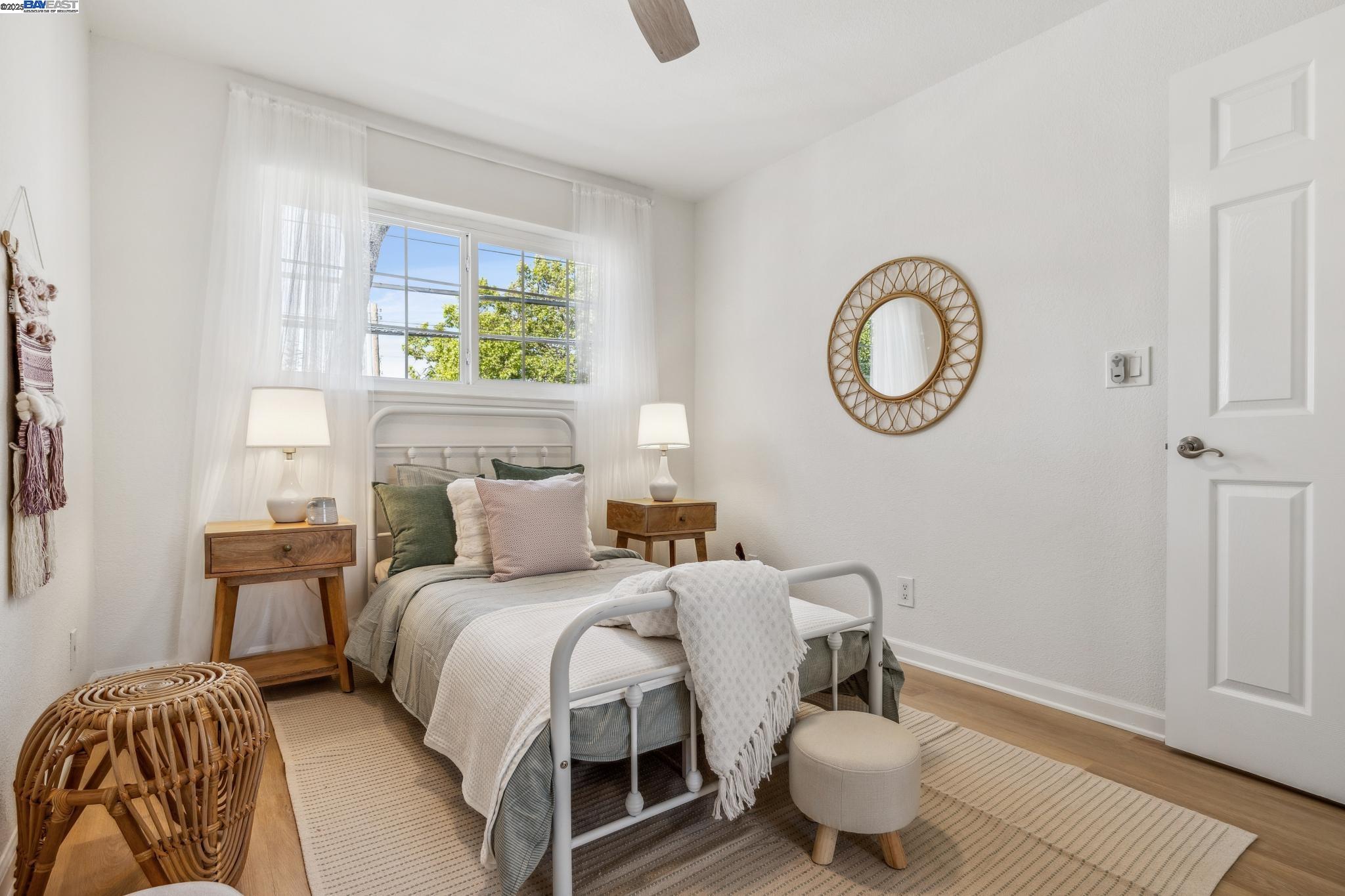 700 Fargo Avenue, Unit 2 San Leandro, CA 94579 - Photo 24 of 39 a bedroom with a bed and a window