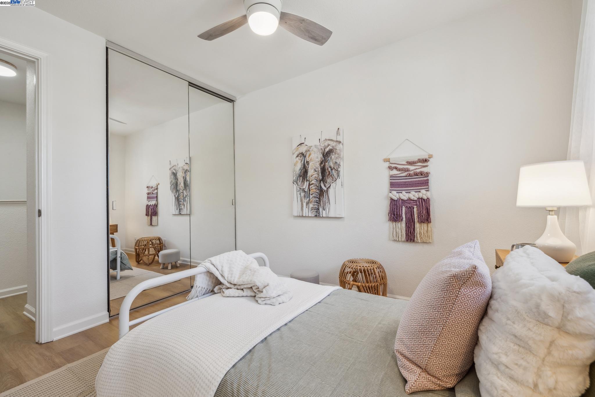 700 Fargo Avenue, Unit 2 San Leandro, CA 94579 - Photo 25 of 39 a bedroom with a bed and a lamp