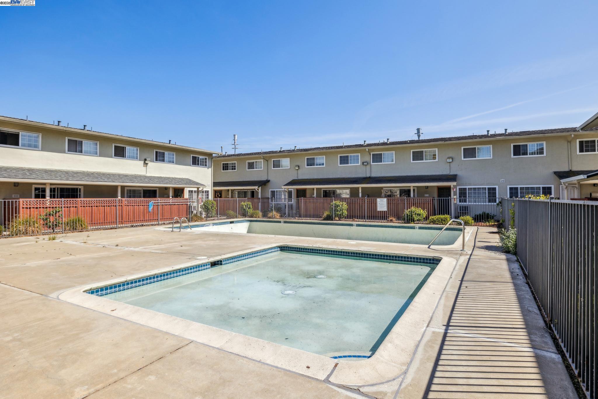 700 Fargo Avenue, Unit 2 San Leandro, CA 94579 - Photo 34 of 39 a view of a building with a swimming pool