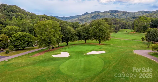 a view of a pathway with a yard