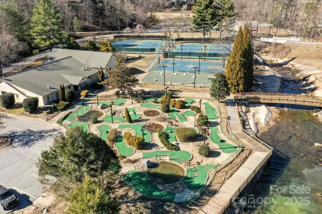 an aerial view of a house with a garden