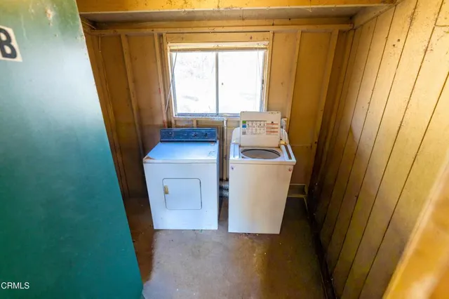 a view of a utility room with washer and dryer