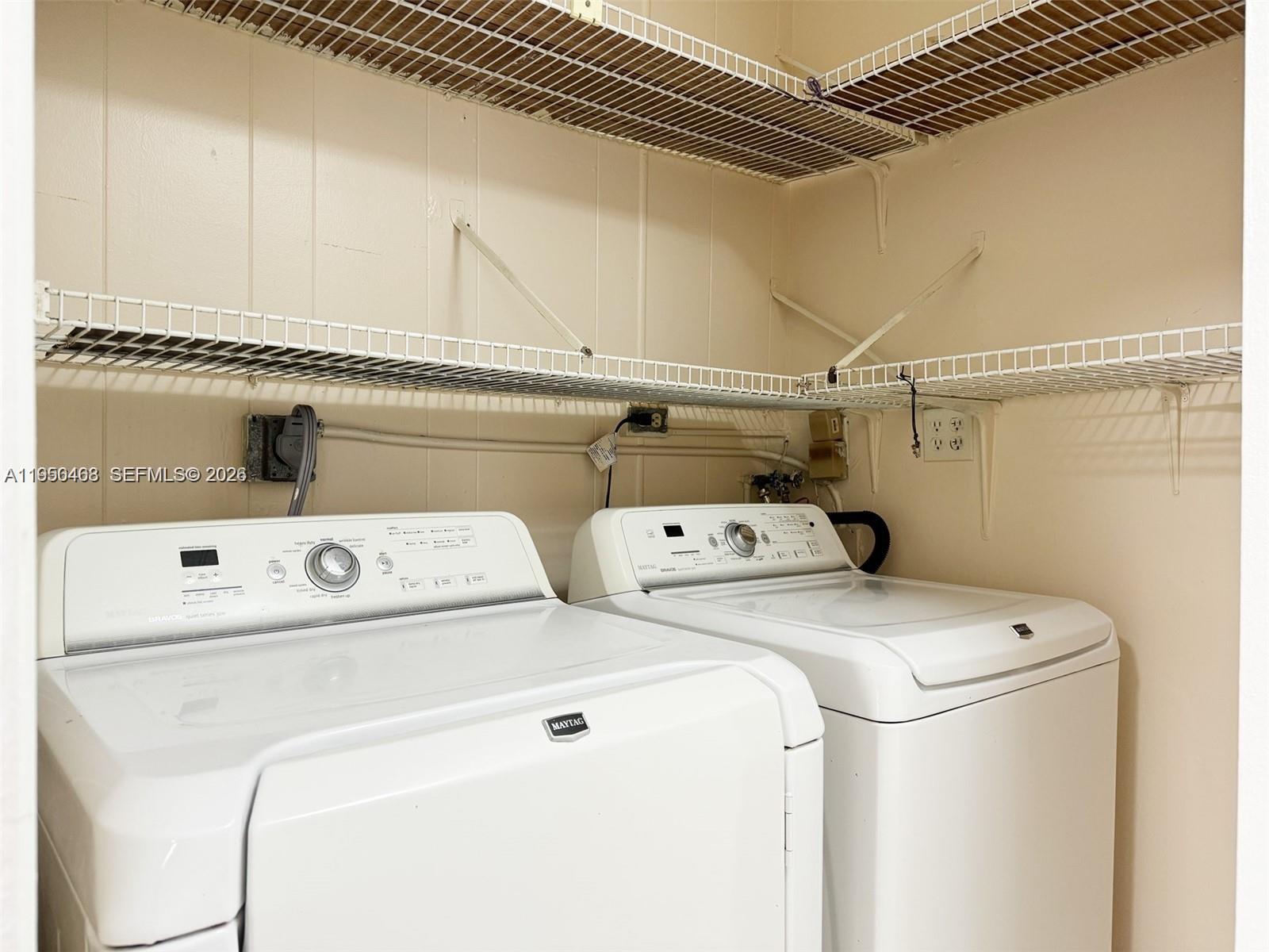 2982 Northwest 95th Street Miami, FL 33147 - Photo 12 of 30 a utility room with dryer and washer