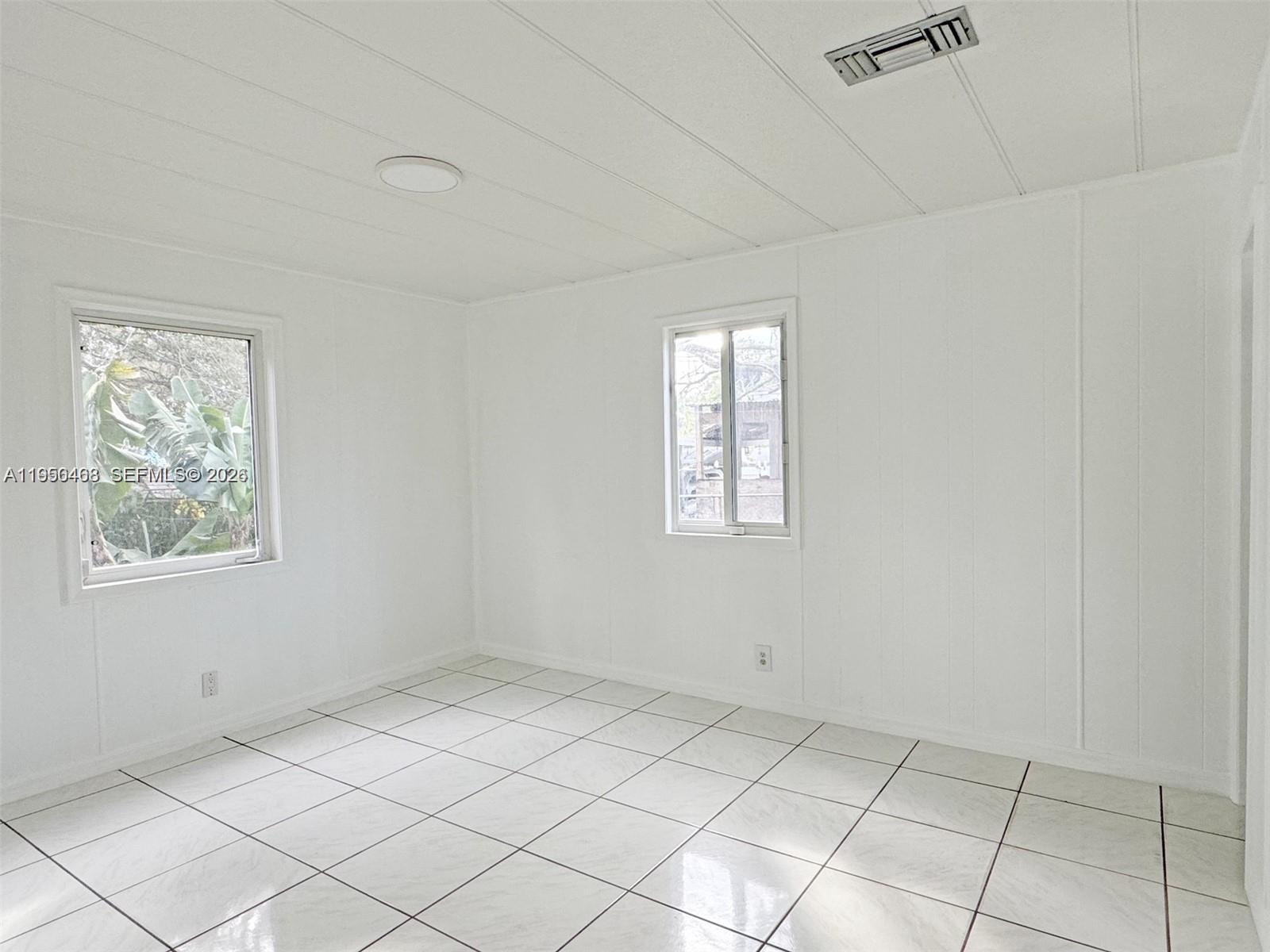 2982 Northwest 95th Street Miami, FL 33147 - Photo 20 of 30 a view of room with window