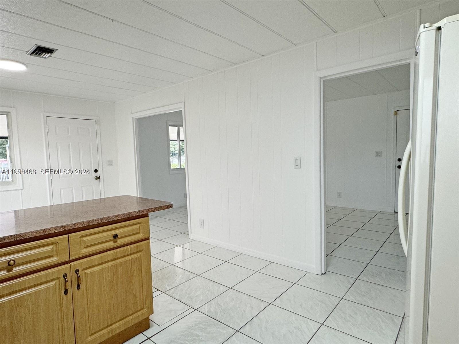 2982 Northwest 95th Street Miami, FL 33147 - Photo 10 of 30 a view of a kitchen with cabinets