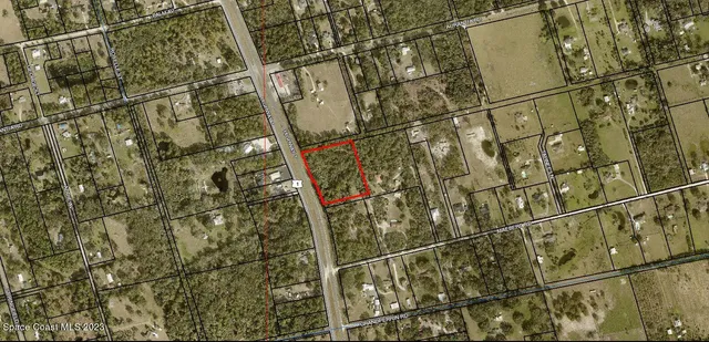 a view of entryway with wooden wall