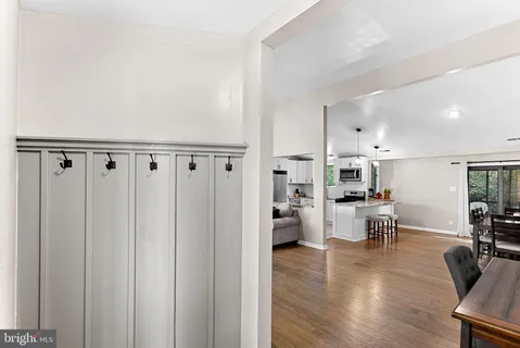 a utility room with sink dryer and washer