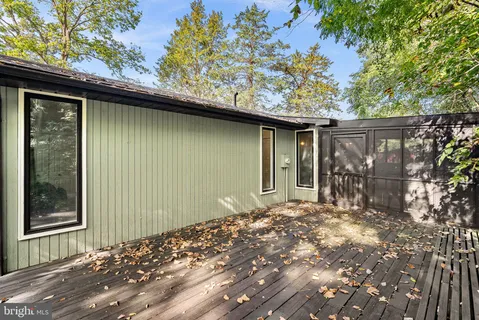 a view of a house with a yard and garage