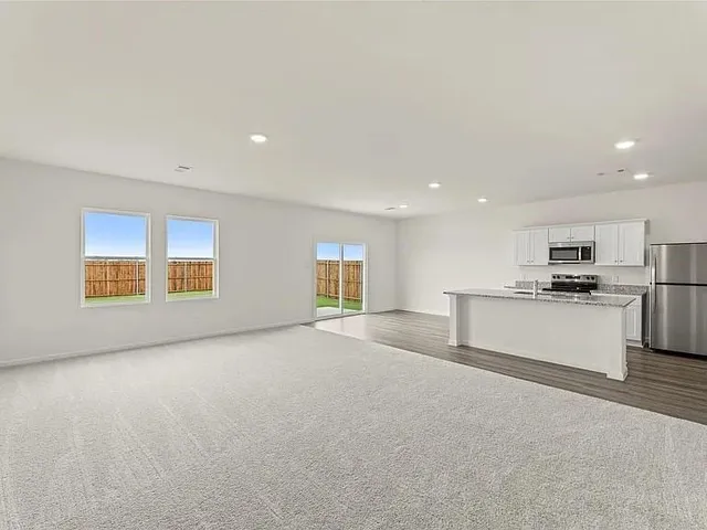 a view of a kitchen with a sink