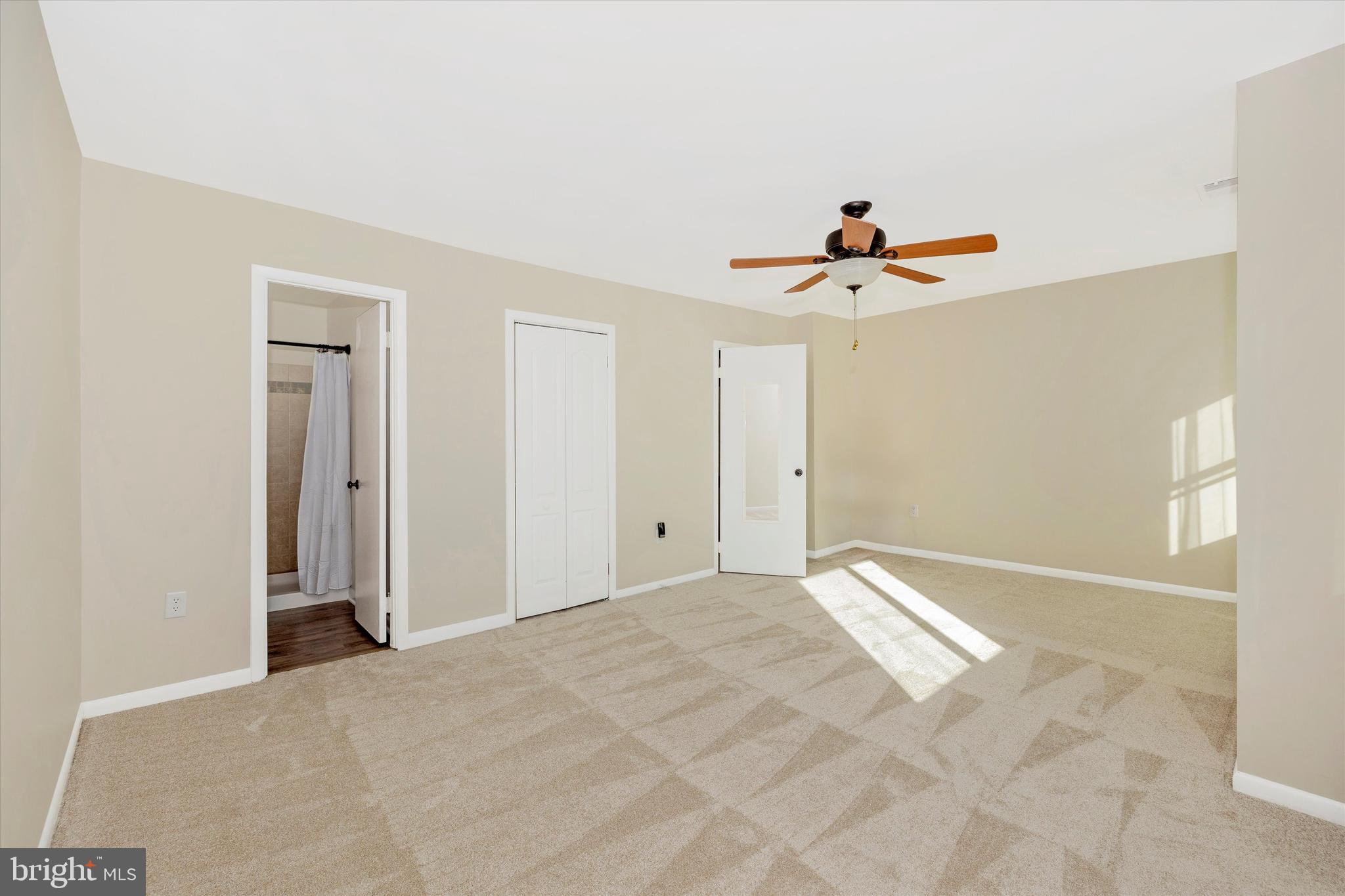 17513 Hoskinson Road Poolesville, MD 20837 - Photo 22 of 44 a view of room with a ceiling fan