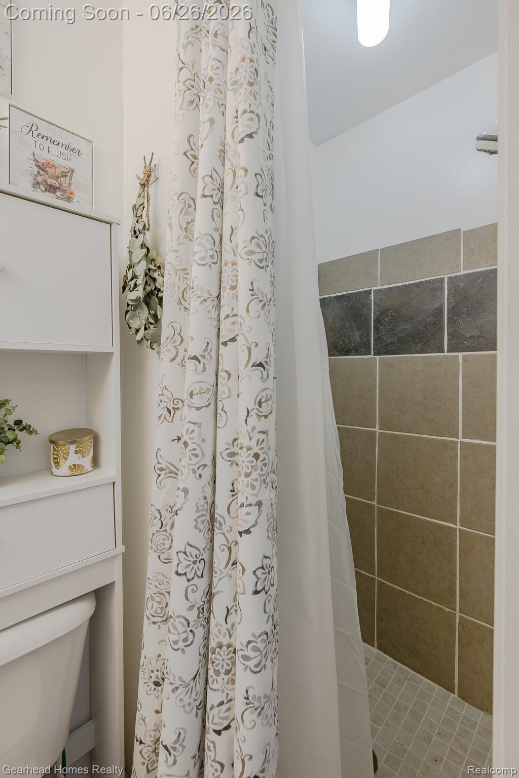 12364 Morrish Road Clio, MI 48420 - Photo 25 of 81 Walk-in shower with varied rectangular and square wall tiling