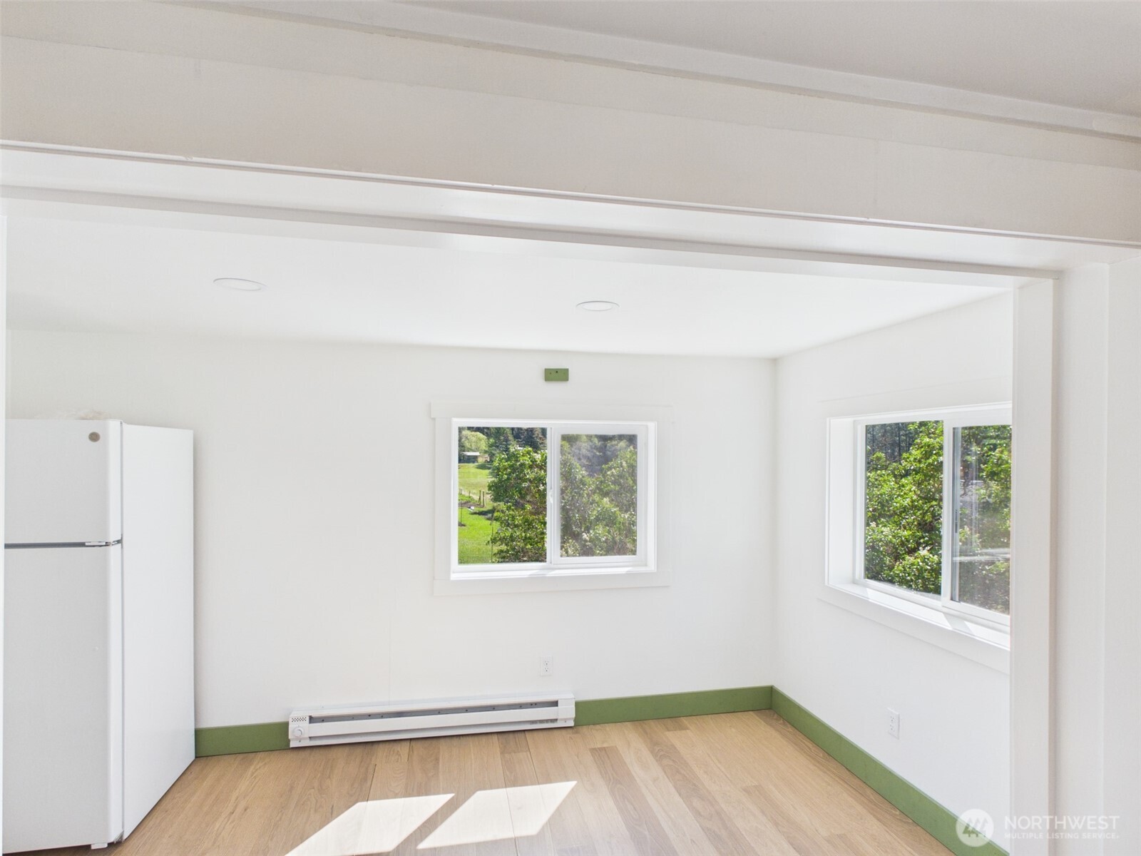 50 Klondike Road Republic, WA 99166 - Photo 8 of 18 a view of a room with wooden floor and a window