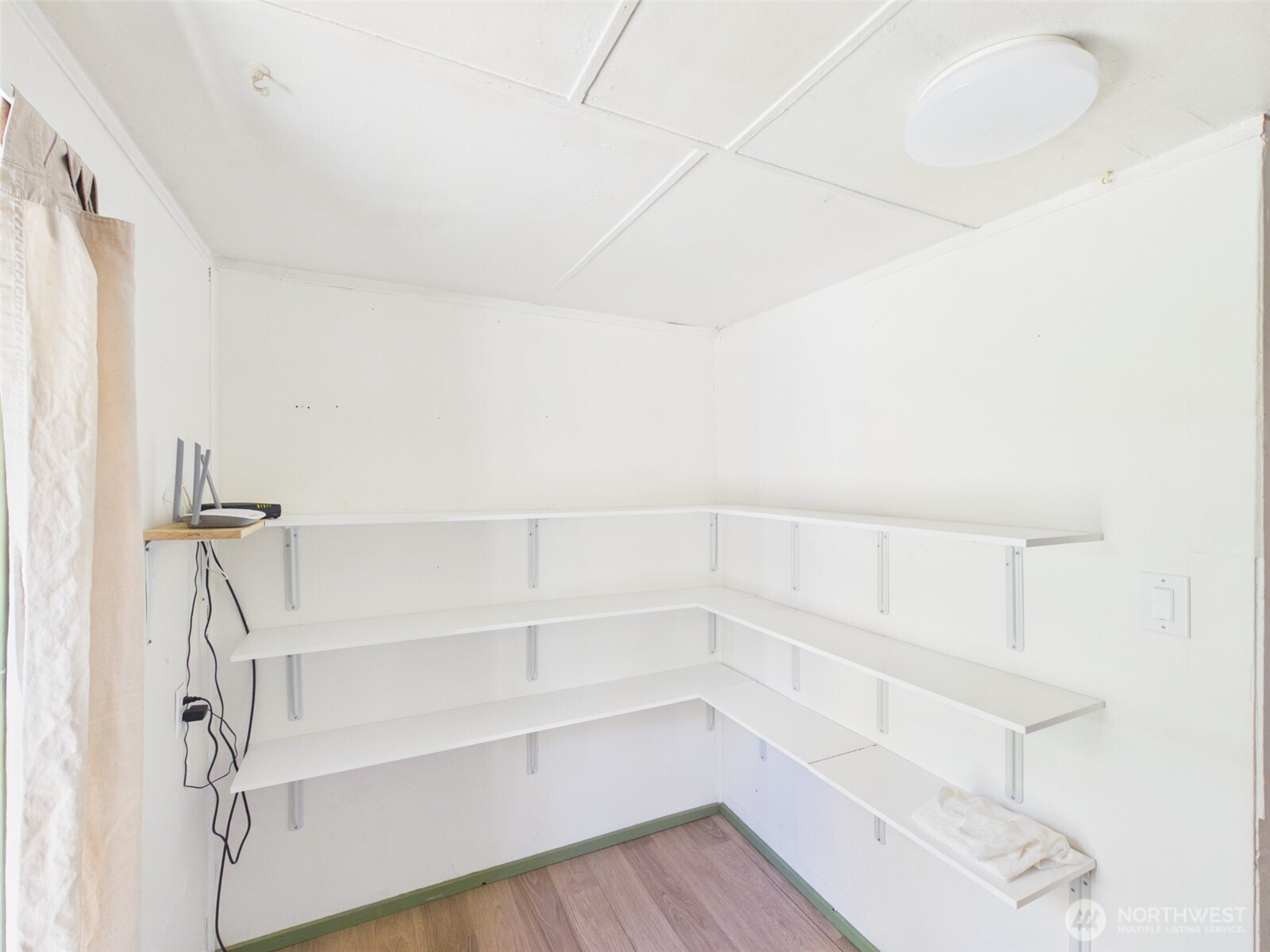 50 Klondike Road Republic, WA 99166 - Photo 9 of 18 a view of walk in closet with empty racks