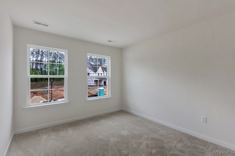 12867 Deep Wl Road Midlothian, VA 23112 - Photo 15 of 40 an empty room with windows