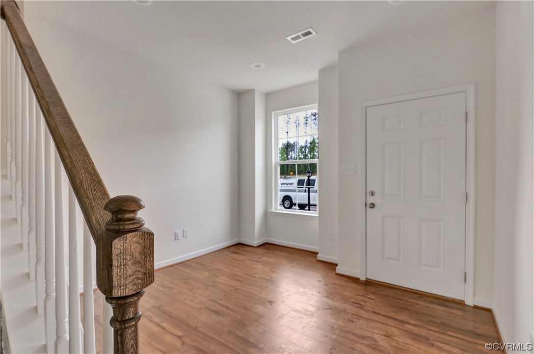 12867 Deep Wl Road Midlothian, VA 23112 - Photo 3 of 40 a view of hallway with wooden floor
