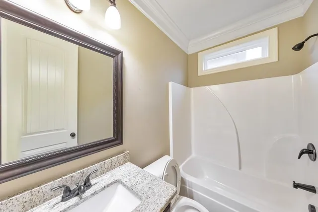 a view of a livingroom with wooden floor