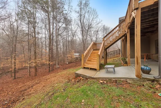 a view of house with yard