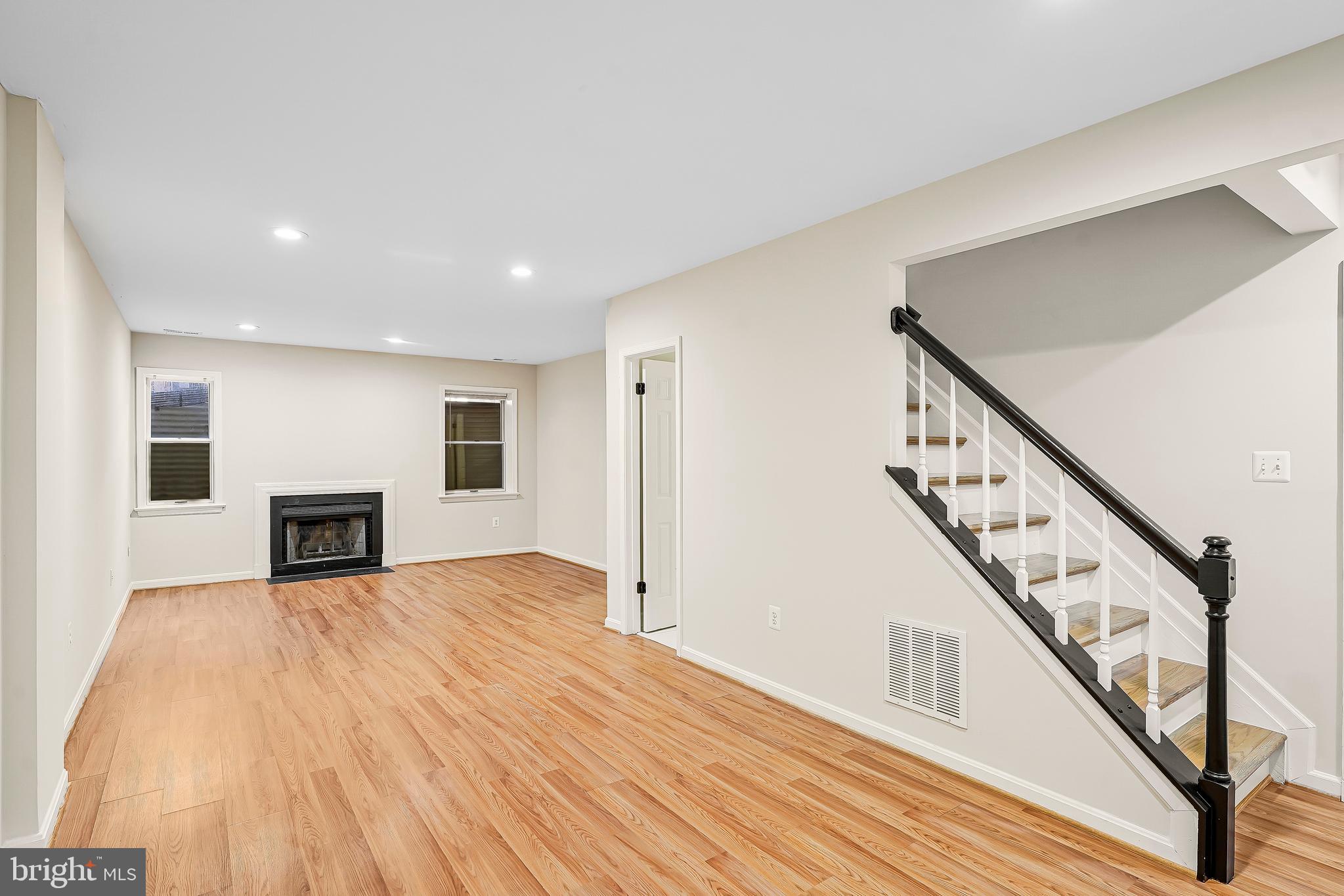 1469 Hampton Hill Circle McLean, VA 22101 - Photo 33 of 62 a view of a livingroom with wooden floor and fireplace