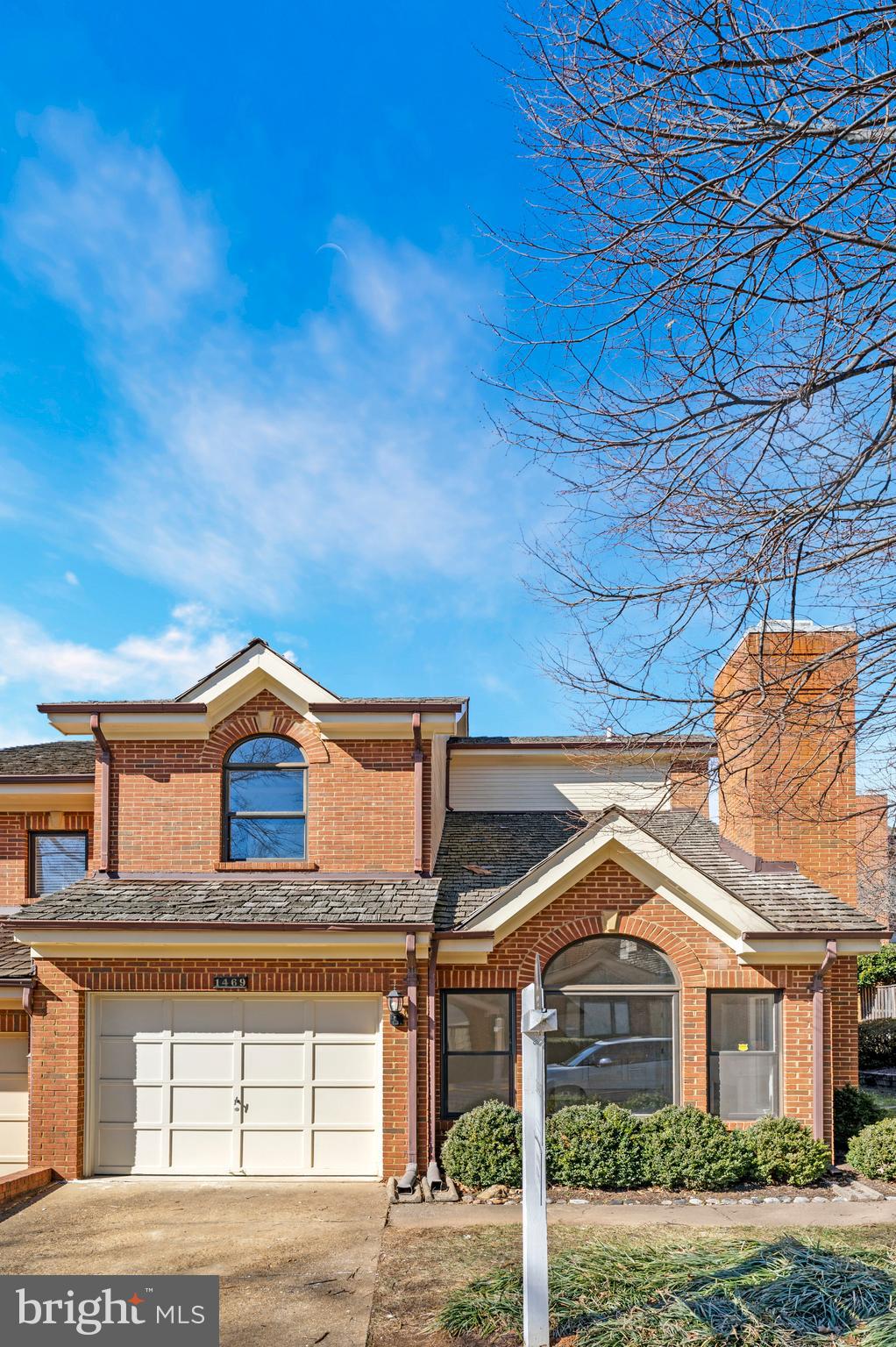 1469 Hampton Hill Circle McLean, VA 22101 - Photo 48 of 62 a front view of a house with garden