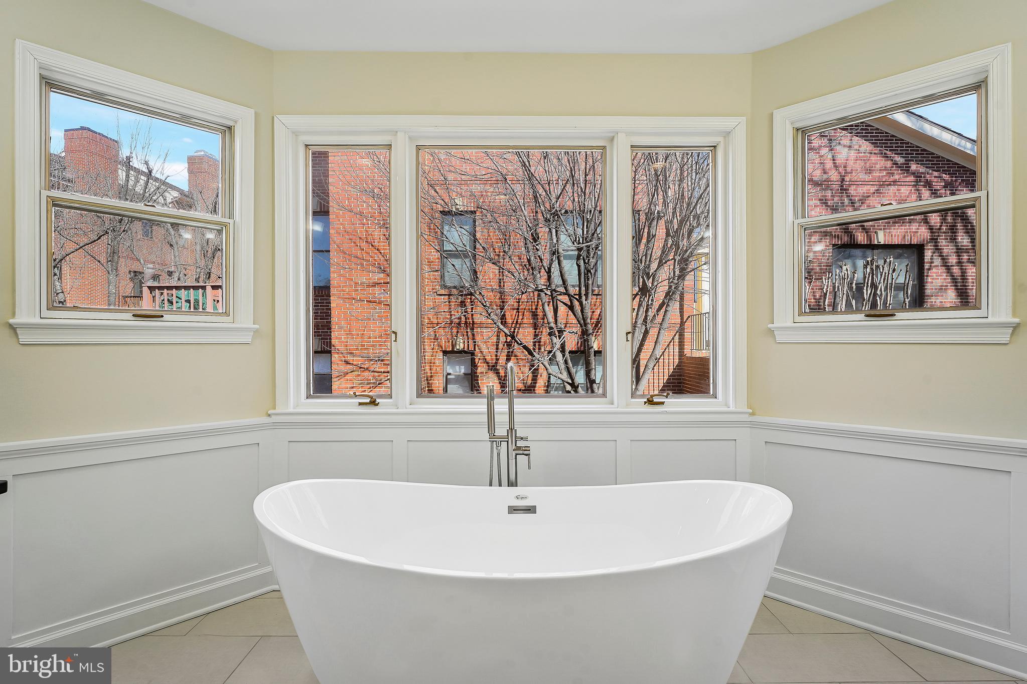 1469 Hampton Hill Circle McLean, VA 22101 - Photo 59 of 62 a white bath tub sitting next to a window