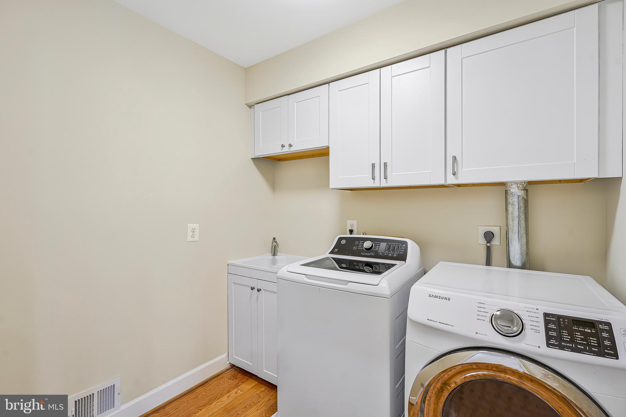 1469 Hampton Hill Circle McLean, VA 22101 - Photo 10 of 62 a view of storage and utility room with washer and dryer