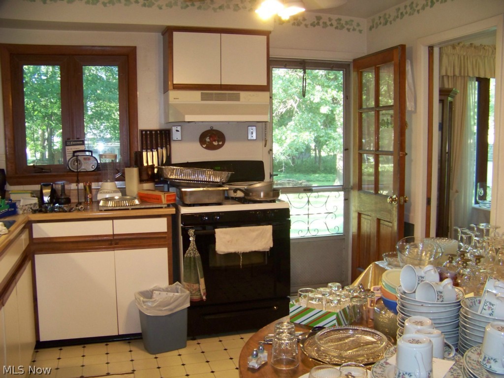5491 Roy Road Cleveland, OH 44143 - Photo 10 of 19 Kitchen door opens to the brick patio. Plenty of room for a table and chairs - kitchen is 12 x 11