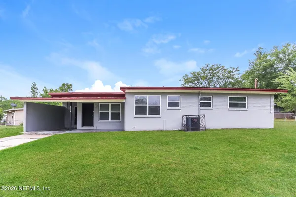 a house view with a garden space