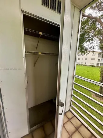 a view of a door and chair