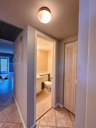 a view of a bathroom from a room