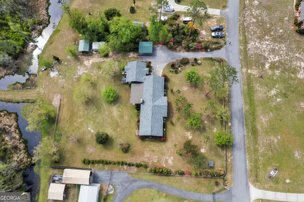 aerial view of a house with outdoor space