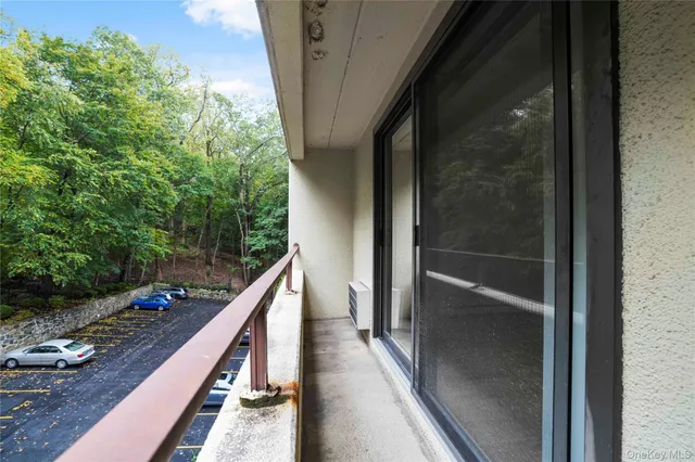a view of balcony and yard