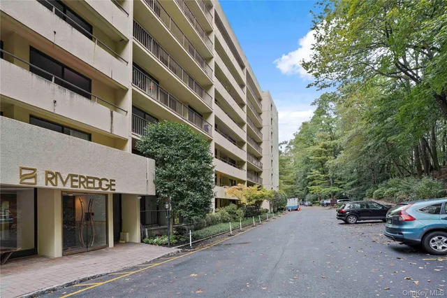 a building with trees in front of it