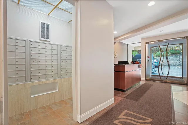 a view of livingroom with furniture wooden floor and windows