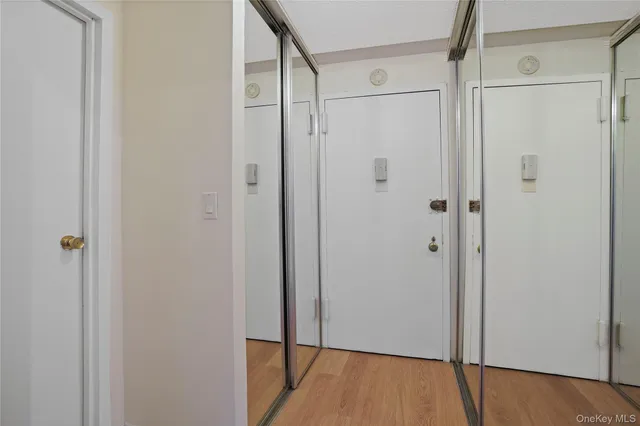 a view of a bathroom with a glass shower door