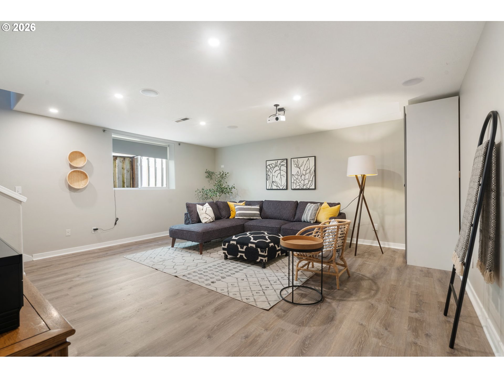 13159 Southwest Brianne Way Portland, OR 97223 - Photo 27 of 32 a living room with furniture and a wooden floor