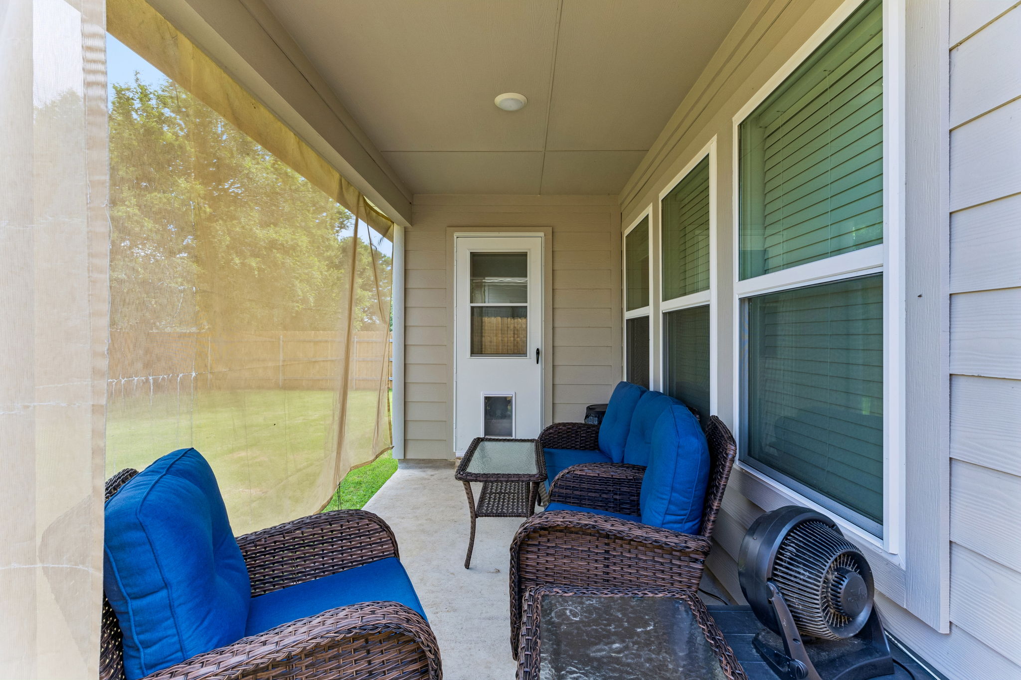 13509 Barn Chime Street Elgin, TX 78621 - Photo 31 of 40 Covered patio featuring a concrete slab and ceiling fan