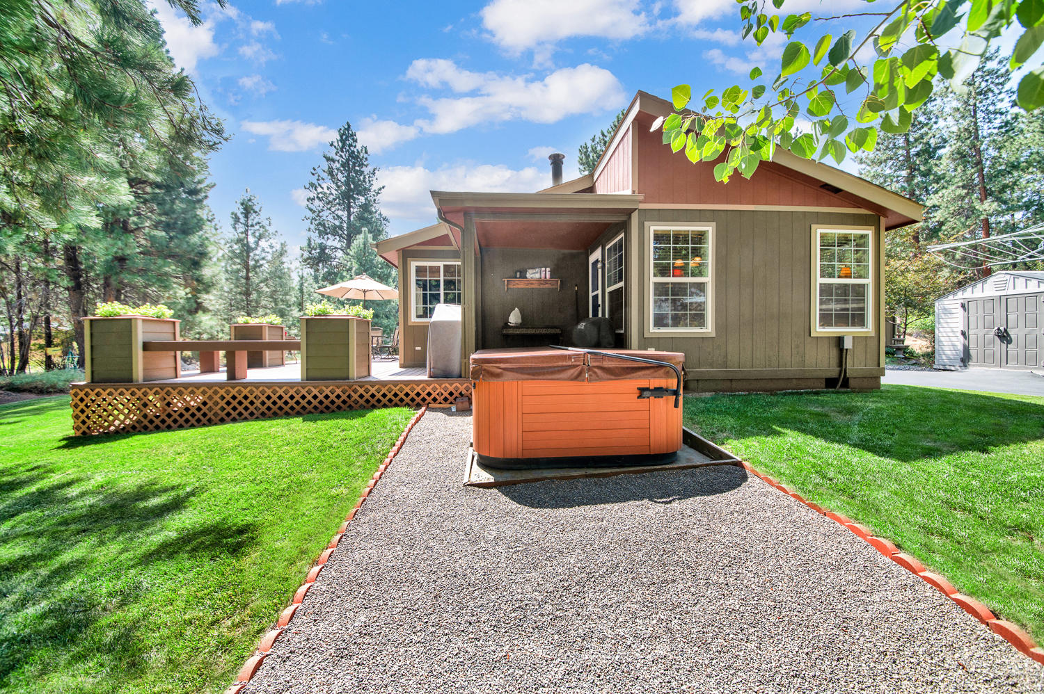 19166 Choctaw Road Bend, OR 97702 - Photo 6 of 23 a front view of a house with a yard