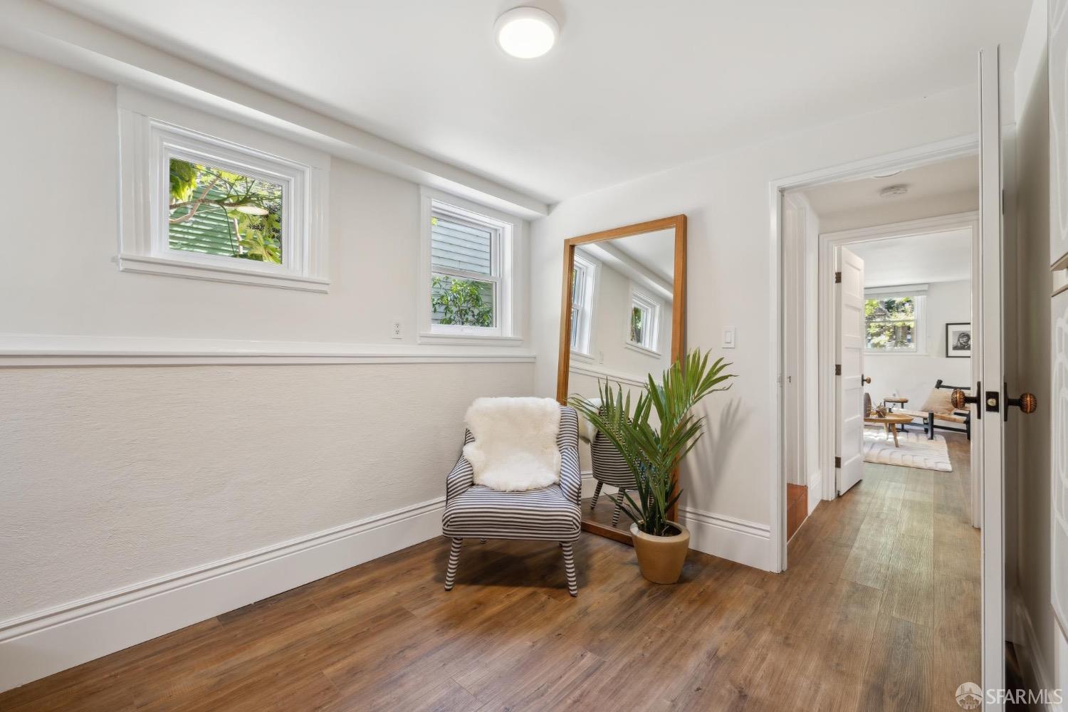 2341 Carleton Street Berkeley, CA 94704 - Photo 34 of 66 a living room with furniture and a potted plant