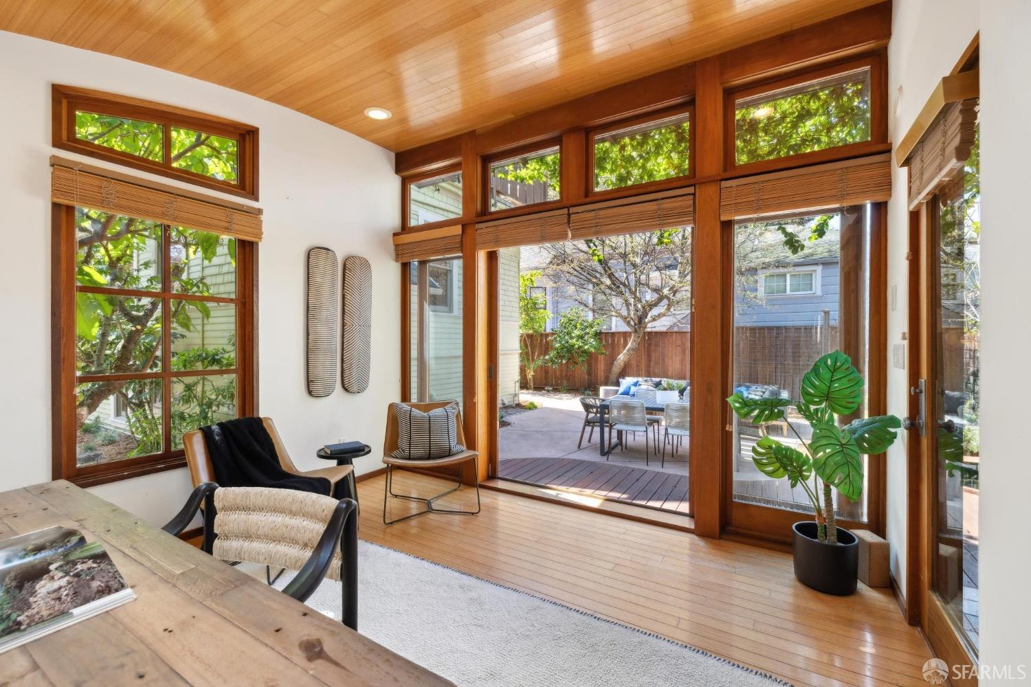 2341 Carleton Street Berkeley, CA 94704 - Photo 51 of 66 a living room with furniture and a large window