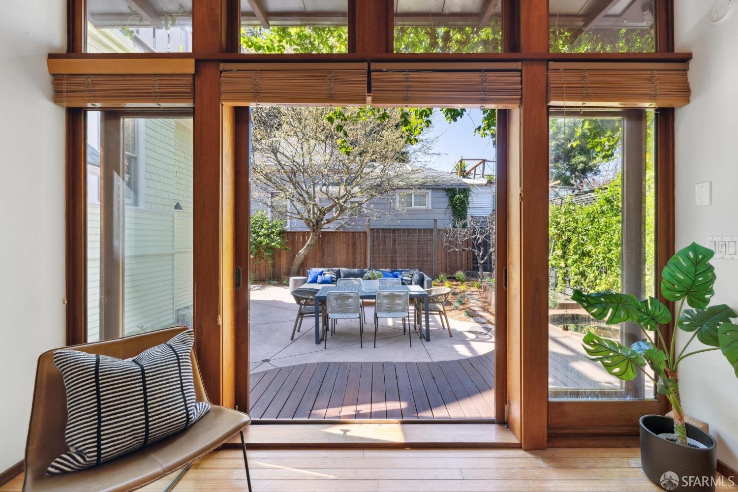 2341 Carleton Street Berkeley, CA 94704 - Photo 52 of 66 a view of living room filled with furniture and a potted plant