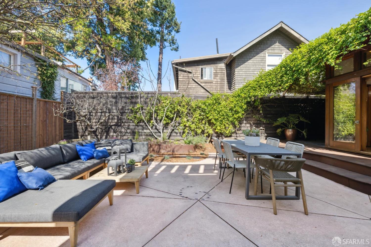 2341 Carleton Street Berkeley, CA 94704 - Photo 57 of 66 a view of a patio with couches table and chairs and potted plants