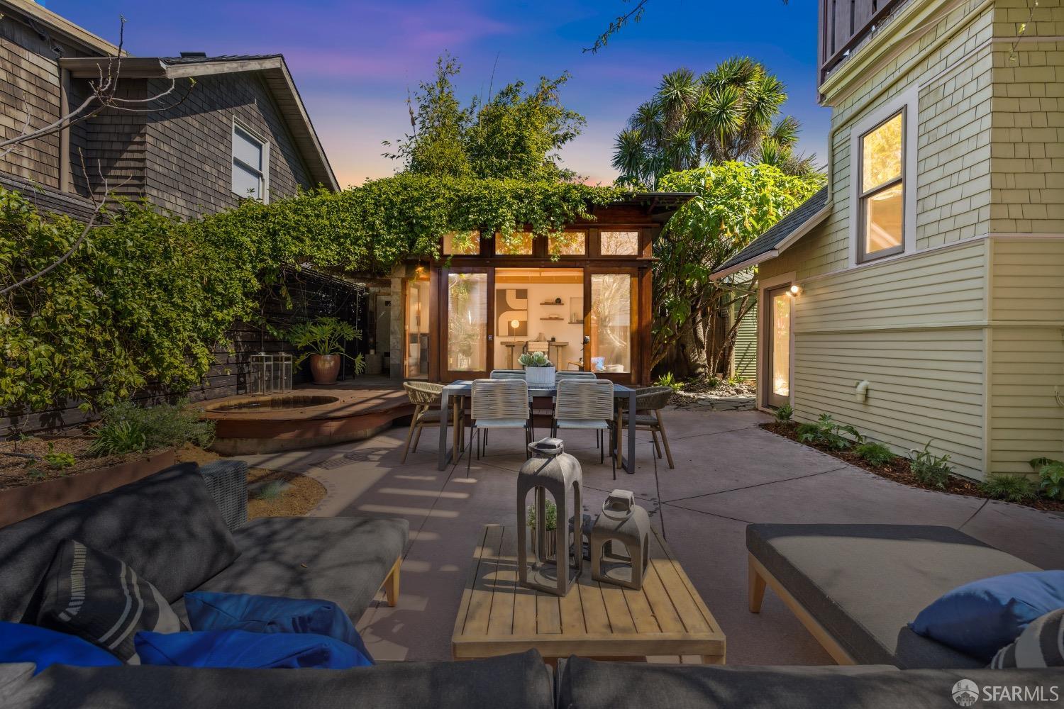 2341 Carleton Street Berkeley, CA 94704 - Photo 65 of 66 a view of a patio with table and chairs and potted plants