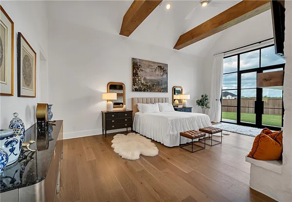 a bedroom with furniture and a bed