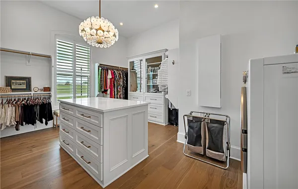 a kitchen with a table and chairs in it