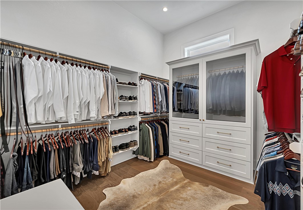 117 Iris Street Lorena, TX 76655 - Photo 23 of 82 a view of walk in closet with clothes and shoes