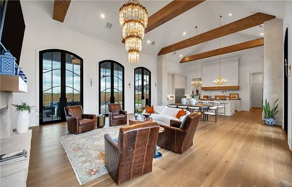 a kitchen with stainless steel appliances granite countertop a stove and cabinets
