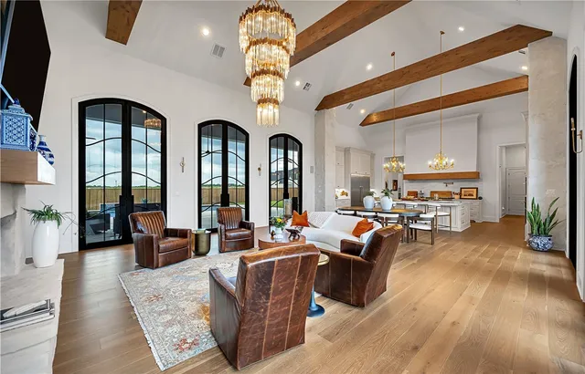 a kitchen with stainless steel appliances granite countertop a stove and cabinets