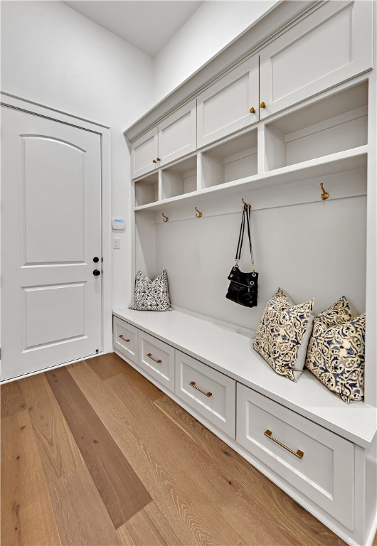 117 Iris Street Lorena, TX 76655 - Photo 41 of 82 a view of a closet with wooden floor