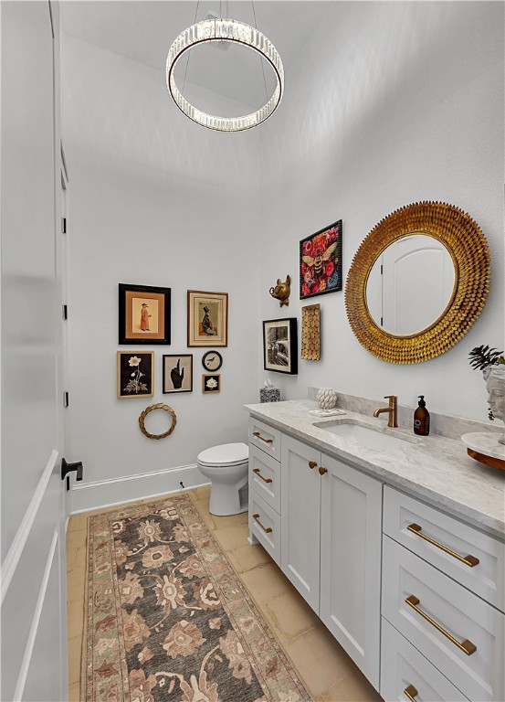 117 Iris Street Lorena, TX 76655 - Photo 53 of 82 a bathroom with a toilet a sink and mirror